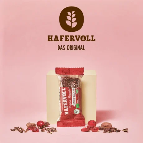 HAFERVOLL Organic Flapjack Cranberry & Cocoa Nib 60g – Verpackung mit HAFERVOLL-Logo und Cranberrys