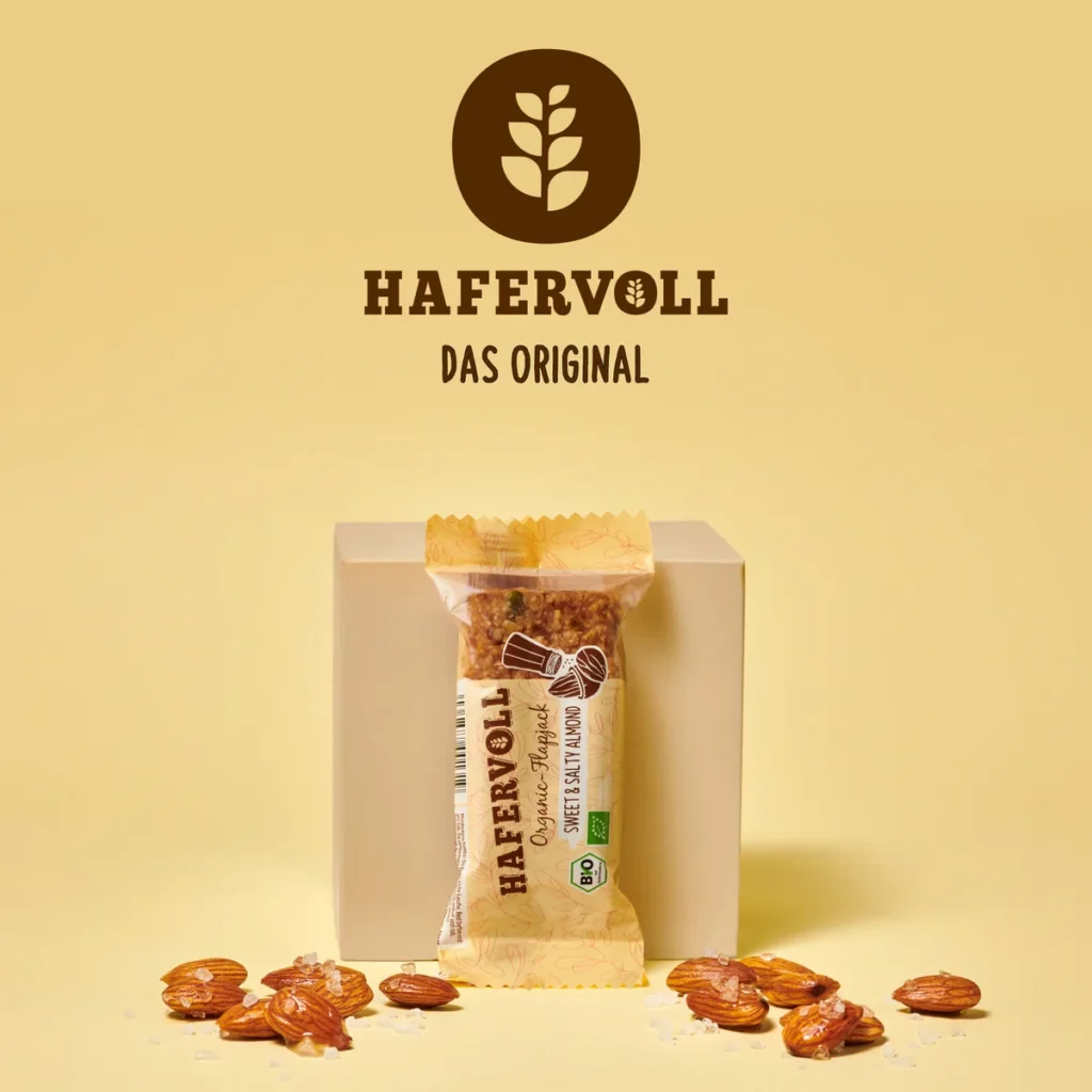 HAFERVOLL Organic Flapjack Sweet & Salty Almond 60g – Verpackung mit HAFERVOLL-Logo und Mandeln