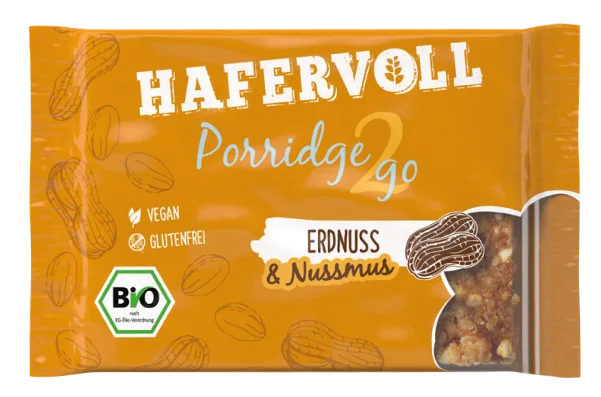 Hafervoll Porridge2Go Riegel Erdnuss & Nussmus in orangefarbener Verpackung – Bio, vegan, glutenfrei